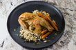 Roasted Cornish Hen with Wild Rice Pilaf and Baby Carrots.