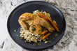 Roasted Cornish Hen with Wild Rice Pilaf and Baby Carrots.