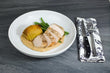 Pan Seared Pork Chop or Chicken Breast with Hasselback Potato, Garlic Haricot Vert and Caramelized Onion Soubise